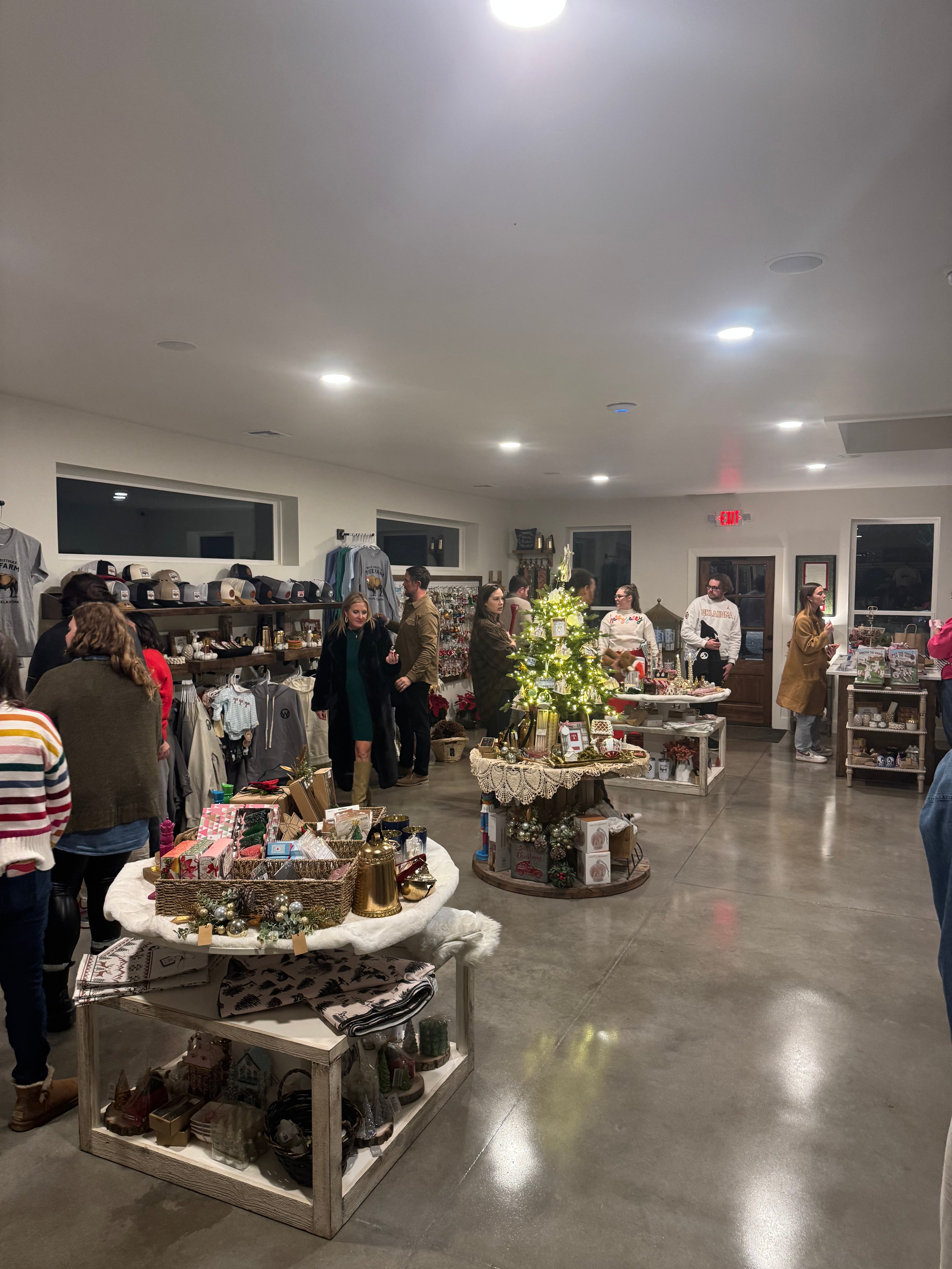 People shopping in a store with various products on display.